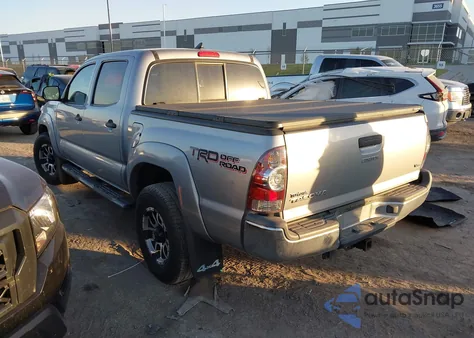 2014 Toyota Tacoma Base V6 z USA, uszkodzony, nr VIN 3TMLU4EN1EM144853